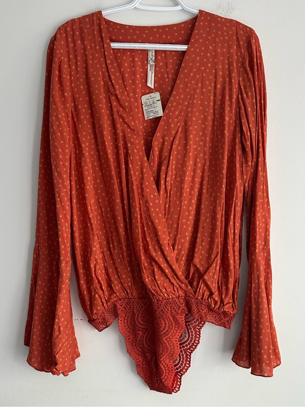NWT Free People Bodysuit Rust Orange Polka Dot Wrap Lace Long Sleeve Top Size L